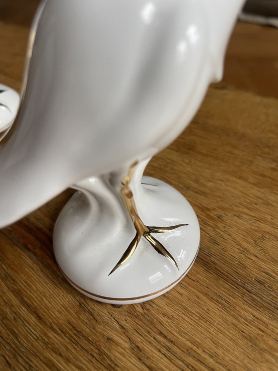 Image 1 of 2 porseleinen vogels met 24 karaat goud