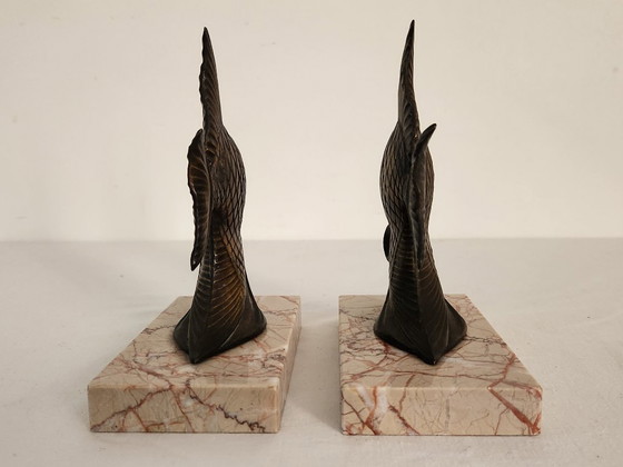 Image 1 of Paar Fischbuchstützen aus Marmor und Bronze im Art déco-Stil
