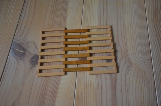 Image 1 of Vintage houten onderzetter, opvouwbaar