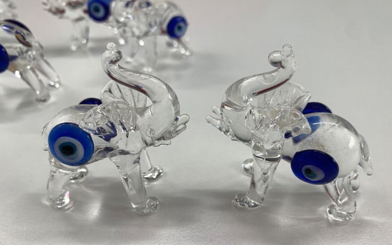 Image 1 of Famiglia di elefanti dagli occhi azzurri in confezione regalo