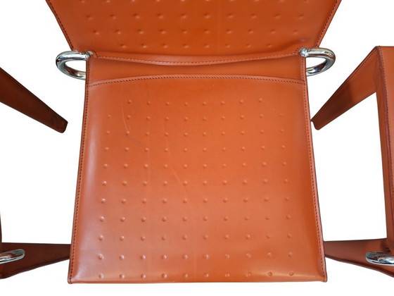 Image 1 of Set van 4 designstoelen in oranje leer en vintage ijzer.