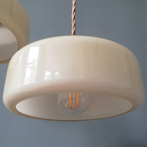 Image 1 of Vintage pendant lamp set (2) of yellow pastel opaline glass. Art Deco design.