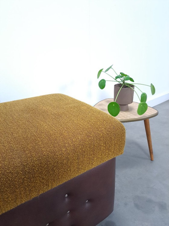 Image 1 of Ottoman with lid on chrome wheels