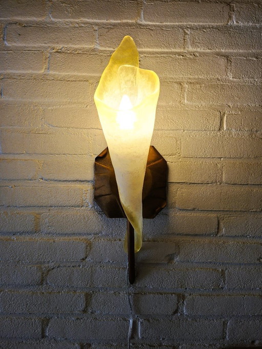 Sillux designer wall lamp with amber-colored glass.
