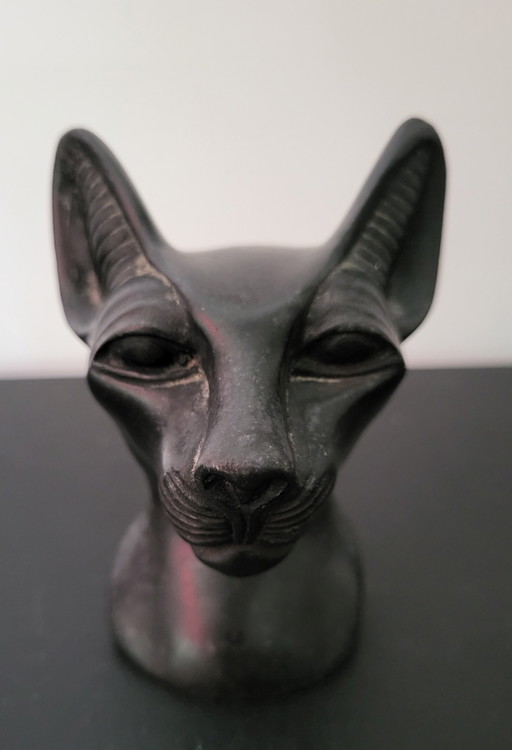 Black stone statuette of the Egyptian goddess Bastet.