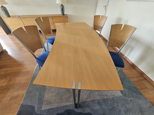 Modern dining room table with chairs