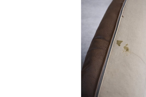 Image 1 of Fauteuil pivotant et repose-pieds en cuir marron, style danois moderne vintage, années 1970, ensemble de 2