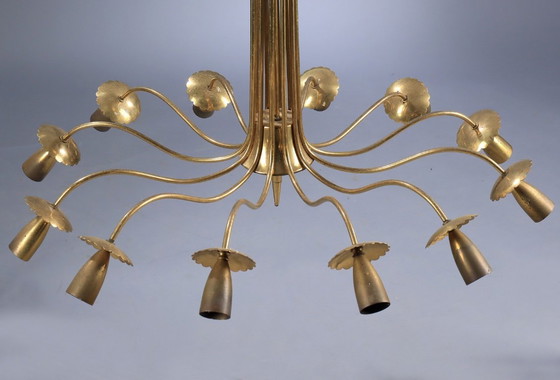 Image 1 of Lustre en laiton attribué par Oscar Torlasco 1970