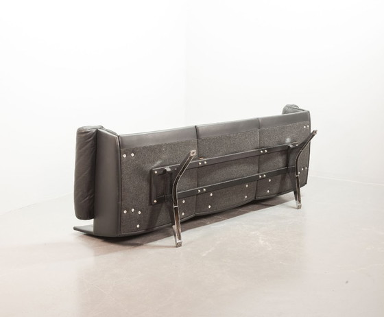 Image 1 of Exquisite Mid-Century Design De Sede Black Leather Strap Stitched Three-Seat Sofa DS31. Switzerland, 1960s.