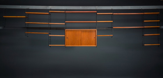 Image 1 of Modulaire wandplank in teak van Nils Strinning voor String, 1960, set van 29