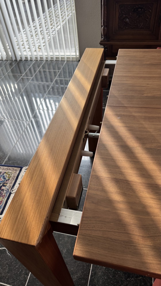 Image 1 of Dining table with 8 leather chairs in my