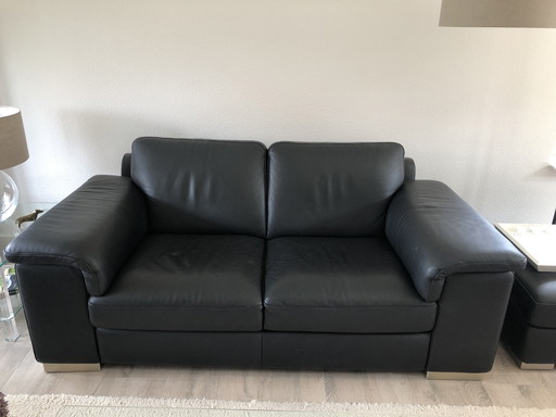 Natuzzi Canapé 2,5 places en cuir noir + Hocker