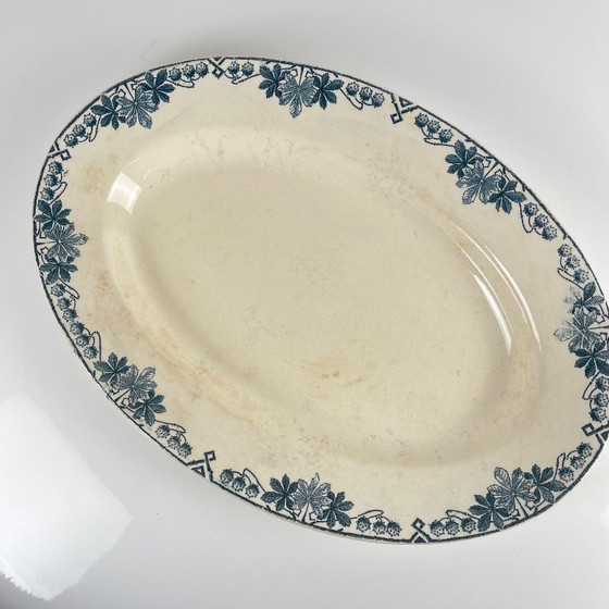 Image 1 of Plato ovalado, modelo "Túnez", de Longwy, finales del siglo XIX.