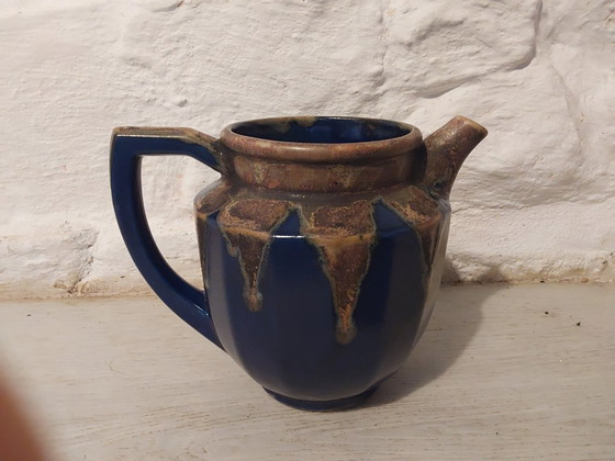 Image 1 of Blue and gold pitcher signed Denbac