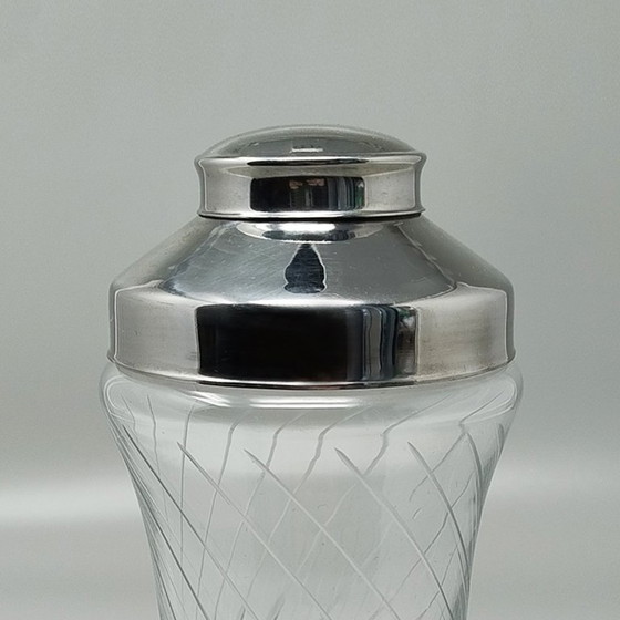 Image 1 of https://madinteriorart.com/collections/tableware/products/1950s-gorgeous-cut-crystal-cocktail-shaker-made-in-italy-copia