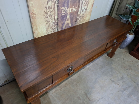 Image 1 of Large, robust teak castle side table, console table, and console, 194x58cm and 78cm high.