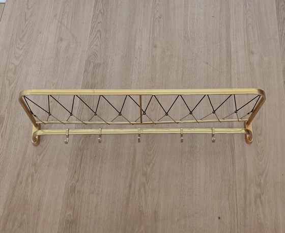 Image 1 of Fifties string coat rack with five coat hooks