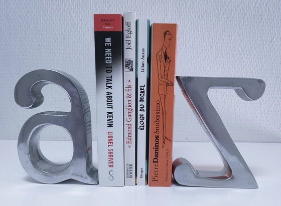 Image 1 of coppia di fermalibri in alluminio pressofuso a forma di "a" e "z"