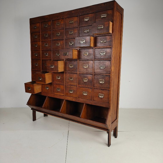 Image 1 of Oak apothecary cabinet from the early 20th century with 42 drawers