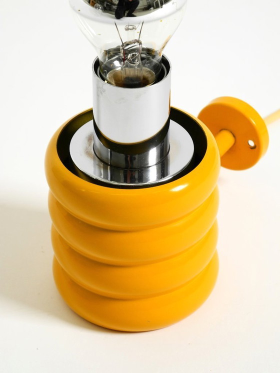 Image 1 of Very rare original 1960s Space Age "Bulb" wall lamp by Ingo Maurer in yellow with a clear glass shade