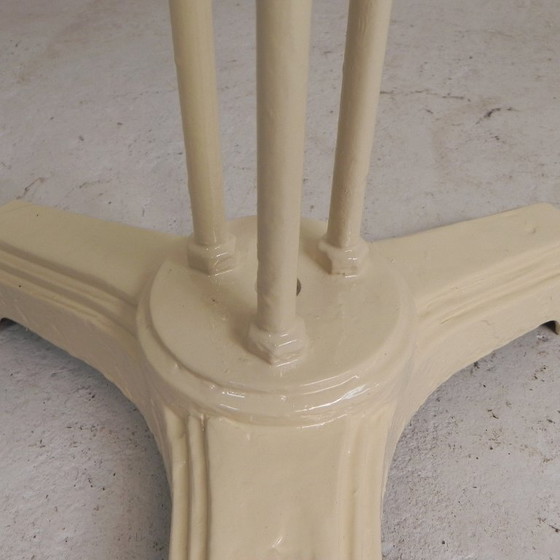 Bistro table with cast iron legs and round steel top, 1930s – Dining tables (photo 11 of 22)