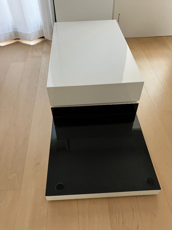 Image 1 of Swivel white/black high gloss coffee table