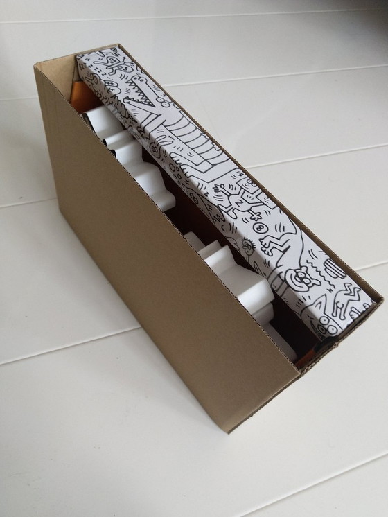 Image 1 of Keith Haring - Limited Edition Dancing Dogs boekensteunen / decoratief object (set)