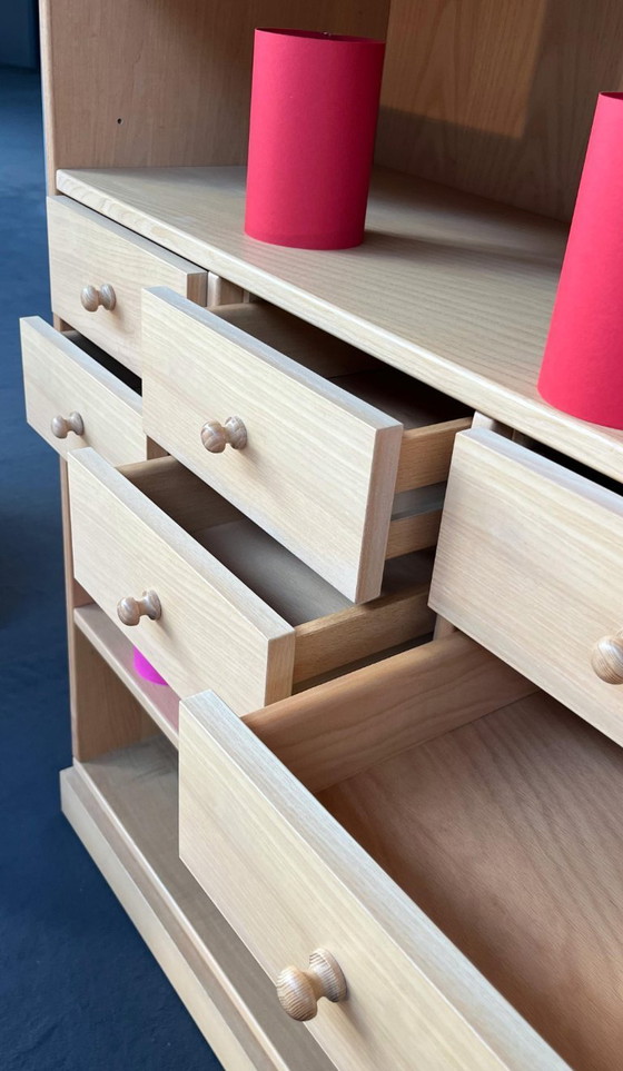 Image 1 of 'Die Collection' Wohnwand 8-teilig mit Vitrine, Schubladenkonsolen, Bücherborden in Esche natur Esche