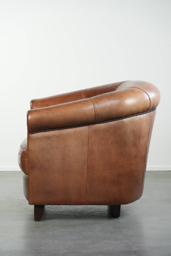 Image 1 of Mooie vintage schapenleren clubfauteuil in Engelse stijl met prachtige diepe kleuren