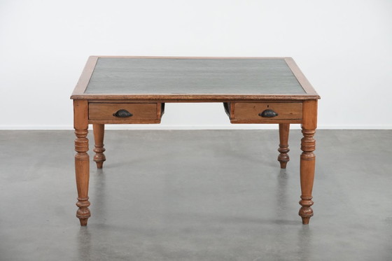 Image 1 of Antique writing table/partner desk with 4 drawers and a green leather top