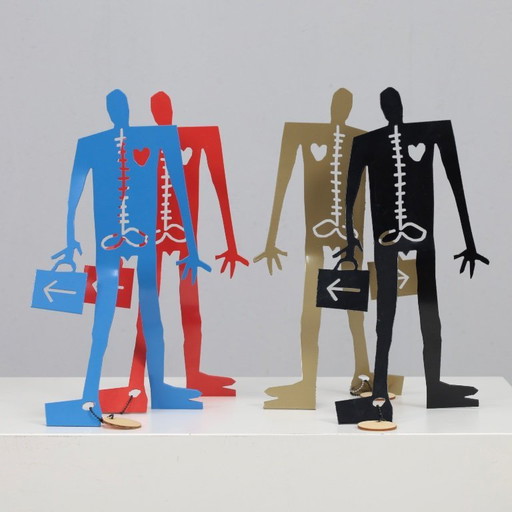 Conjunto de 4 esculturas metálicas “Coeneman” de Coen Blankwaard, Países Bajos, década de 2000.