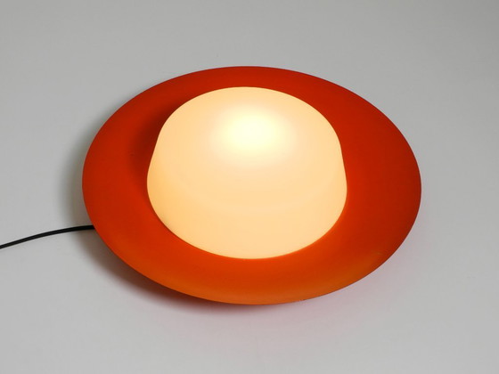 Image 1 of Grote Mid Century wand- of plafondlamp van glas met metalen reflector in rood van Kaiser Leuchten