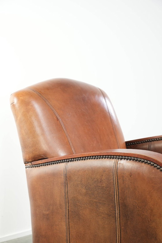 Image 1 of Beautiful sheepskin armchair in Art Deco style with wooden armrests