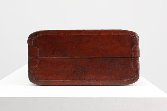 Image 1 of Vintage brown leather suitcase with copper details, China 1900s