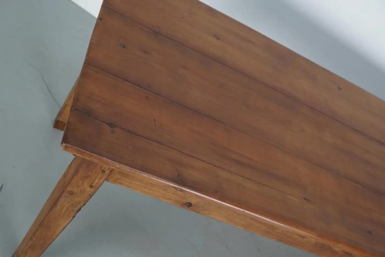 Image 1 of Early 20th-century French rustic country dining table made of fruitwood
