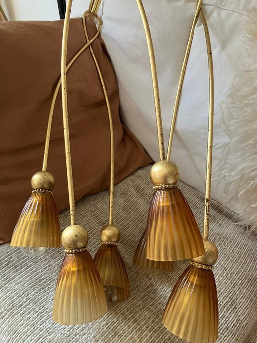 Vintage pendant lights with amber glass chalices and gold metal frame