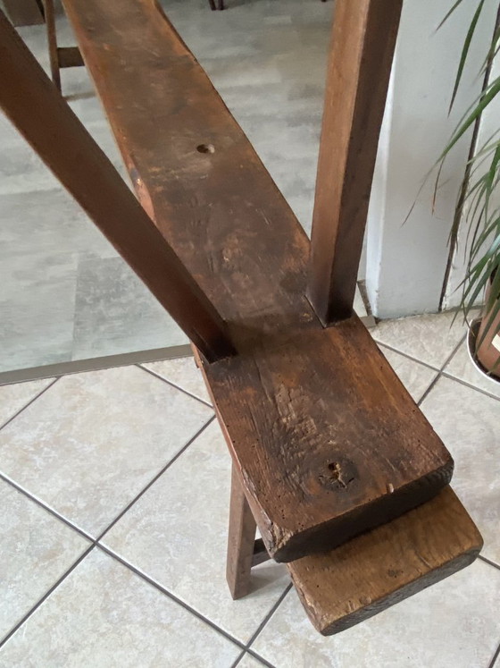 Image 1 of Twee massief eikenhouten boerenbanken van 214 cm voor een rustieke boerentafel uit de jaren 50.