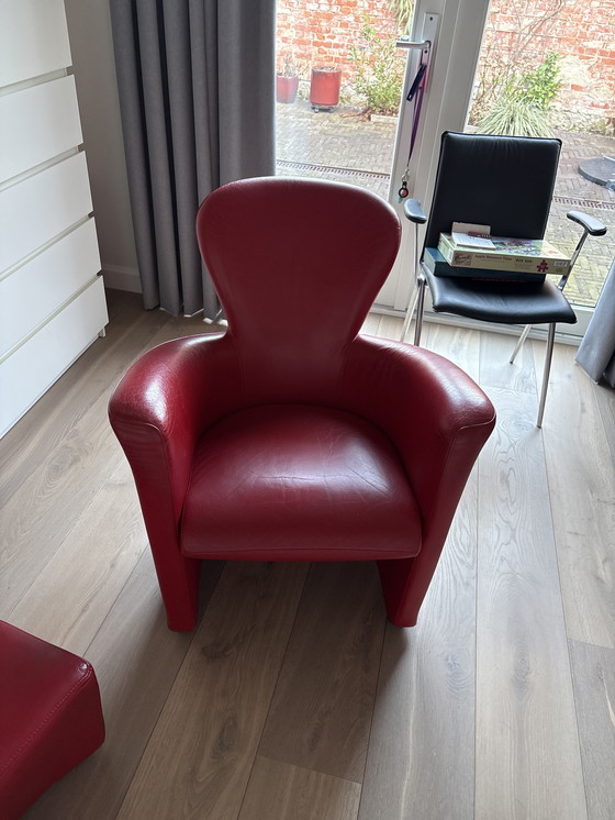 Image 1 of Fauteuil Leolux en cuir rouge avec repose-pieds