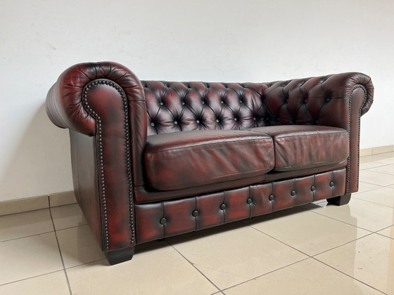Image 1 of Chesterfield Sofa in Oxblood Leather – Fully Restored, Classic Design