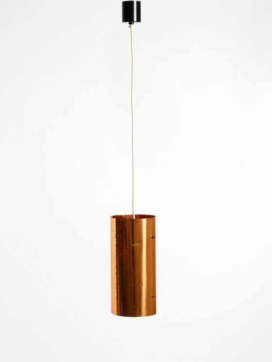 Image 1 of Two rare mid-century tube pendant lamps consisting of two screwed-together copper bowls