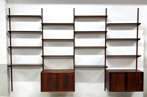 Sistema a parete modulare in palissandro di Kai Kristiansen per Feldballes