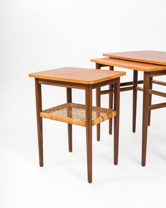 Image 1 of Mid Century Danish Nesting Tables Made Of Teak And Rattan