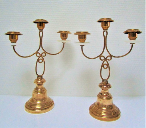 pair of three-branched brass stone candlesticks early 20th century