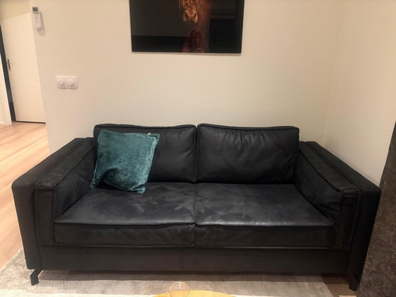 Image 1 of Black three-seater sofa - as good as new