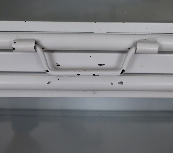 Image 1 of Vetrina vintage in metallo con 9 ante a ribalta in vetro.