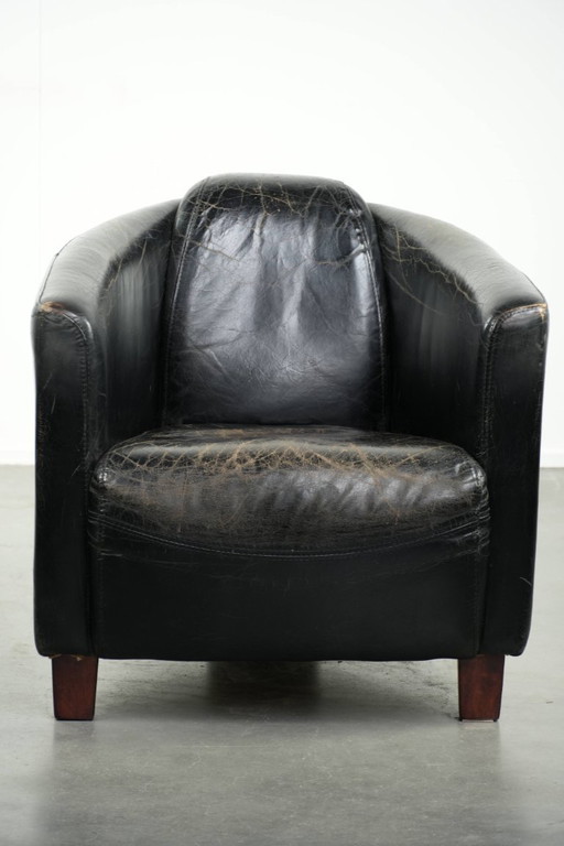 Leuke rundleren aviator fauteuil in stoer zwart vintage rundleer met een stoer een rijk patina