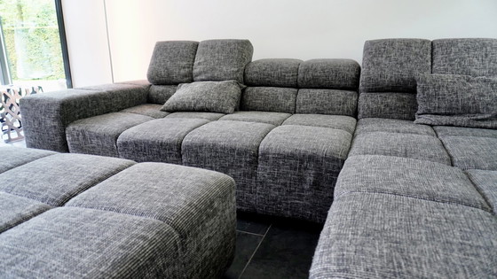 Image 1 of Moderne Grijze Hoekbank met Hocker - Comfortabel en Stijlvol