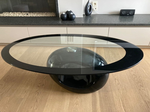Table basse ovale vintage avec piètement laqué brillant – Verre et noir laqué brillant