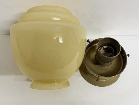 Image 1 of Art Deco Thabur lamp brass fixture yellow glazed stepped shade
