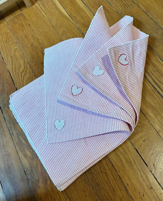 Image 1 of Set of 4 pink and white gingham cotton placemats with heart embroidery